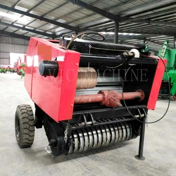 Mobile hay baler with tractor driven